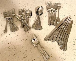 Item 206:  Oneida Silverware:  $65                                                                                         12 dinner knives, 12 salad forks, 12 knives, 12 teaspoons, 12 soup spoons, 1 butter knife, 1 sugar spoon