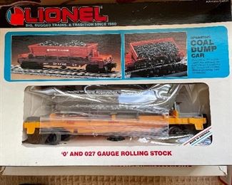 Item 121:  Lionel "0" and 027 Gauge Rolling Stock Coal Dump Car: $35