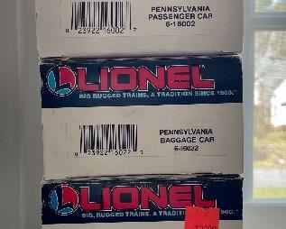 Item 122:  Lionel Pennsylvania Combo Car:  $28                               Item 123:  Lionel Pennsylvania Passenger Car:  $28                                     Item 124:  Lionel Pennsylvania Baggage Car:  $34                                        Item 125:  Lionel CSX Reefer:  $16                                                                           Item 126:  Lionel Pennsylvania Vista Dome Car:  $28