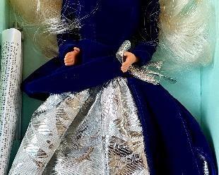 Item 132:  Avon's Winter Velvet Barbie:  $10