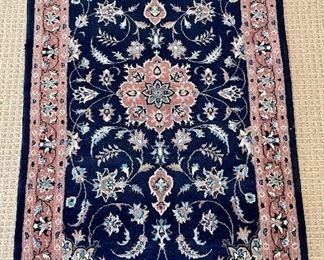 Item 50:  Oriental Area Rug - 54.5" x 30":  $125