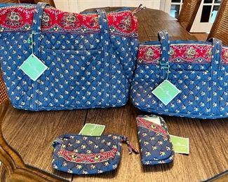 Item 249:  Vera Bradley Tote Bag (upper left):  $48                                                  Item 250:  Vera Bradley Purse (upper right):  $36                                                         Item 251:  Vera Bradley Cosmetic Bag (bottom left):  $12                                      Item 252:  Vera Bradley Eye Glass Case (bottom right): $8