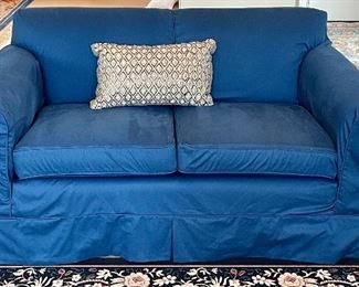 Here is same love seat with custom slip cover! Very comfortable!