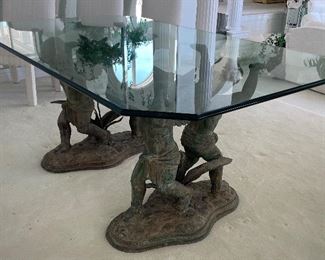 3_____ $1,150 
Glass top Bronze angel base dining table 6L x 44Wx 30H