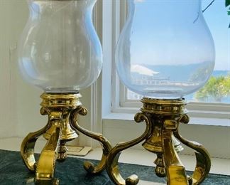 27_____ $100 
Set of two hurricane candleholder brass and glass 19T x 8W