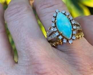 G - $650 - Opal & Diamond ring - 14kt yellow gold opal & diamond ring with 14x7 mm marquise shaped fired opal. All stones are natural & prone set. Total Diamond weight 0.50 carats. Color G/H Clarity : Si1/2. 10 grams. Finger size 6 - Appraisal included. 