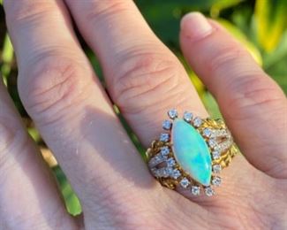 G - $650 - Opal & Diamond ring - 14kt yellow gold opal & diamond ring with 14x7 mm marquise shaped fired opal. All stones are natural & prone set. Total Diamond weight 0.50 carats. Color G/H Clarity : Si1/2. 10 grams. Finger size 6 -Appraisal included. 