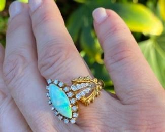 G - $650 - Opal & Diamond ring - 14kt yellow gold opal & diamond ring with 14x7 mm marquise shaped fired opal. All stones are natural & prone set. Total Diamond weight 0.50 carats. Color G/H Clarity : Si1/2. 10 grams. Finger size 6 - Appraisal included. 