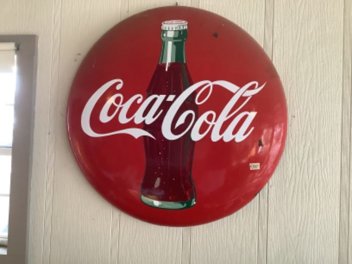 Coca-Cola button sign