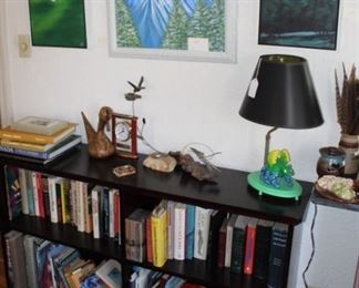 Fair amount of books.  Original paintings by L. Lisantano. 