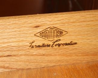 United Furniture Corporation is the manufacturer of the furniture in this bedroom.