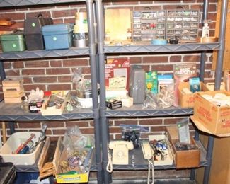 Basement is packed with tools, hardware older phones, etc.