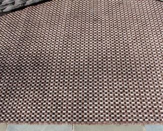 Outdoor rug. $50.00.  Call Jan Hoff to view 314-960-5700.