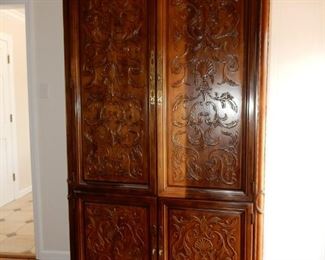 Wonderful entertainment center..door is sun-faded & needs to be refinished..it's a gorgeous piece!
