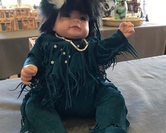 This is a sweet Native American baby girl.  As darling as can be!! Handmade porcelain doll, signed by artist Linda Lee.