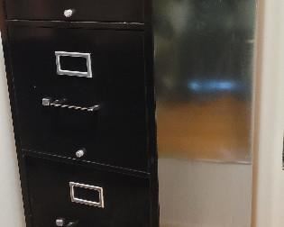 Deep 4 drawer locking file cabinet.