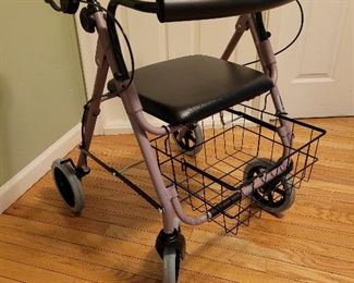 Heavy Duty rolling walker w/seat & carrying basket.