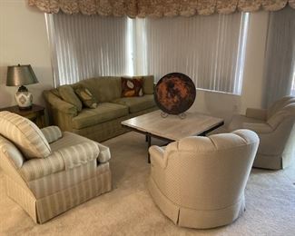 Living Room Furniture.  Thomasville Sofa and striped chair.  Contemporary coffee table with stone top