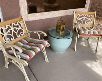 Iron Patio chairs.  Pot/table with glass top