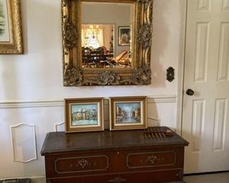 Tourist paintings, cedar chest, great mirror