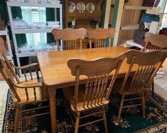 Oak Table with 6 Carved Back Chairs 
