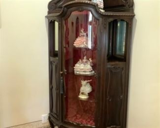 Carved dark walnut corner curio cabinet $1,000