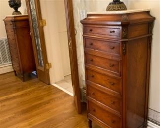 Pair Oskar Huber marble top lingerie chests $1,200 pr. Pair bronze rams head mounts black marble urns $750pr