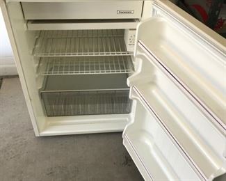 Small fridge in good condition. Great for the garage or patio