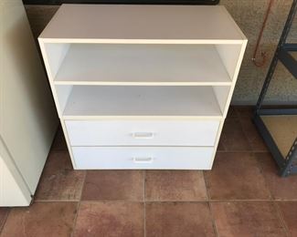 Storage with two drawers and shelves.