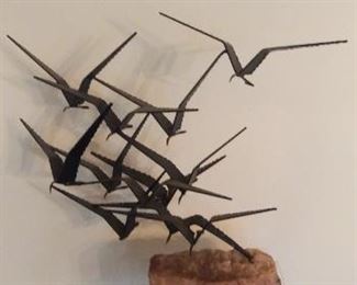 Sun Room:   This vintage 1968 mid-century "C. Jere" cut steel sculpture on quartz stone measures 23" wide from wingtip to wingtip and 20" tall from the bottom of the stone. It is titled "Birds in Flight".  The next photo shows the signature.