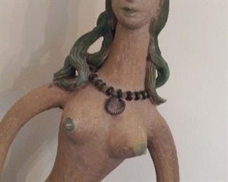 Sun Room:   The sweet face of the mermaid is now better seen.  It was made by an East Coast artisan.