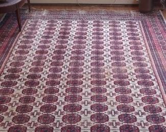 Sun Room:   This antique "Bokhara" rug measures approximately 8'  x  10'  8".