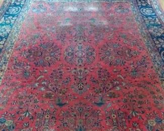 Dining Room:  This antique "Persian Tabriz"  rug in the classic red and blue colors measures approximately 8'  1"  x 12'  7".