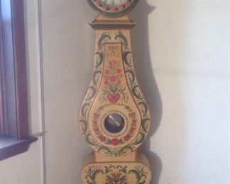 Living Room:  A Swedish Gustavian Mora-style longcase clock measures  80" tall and was hand made and custom painted with an inscribed  date of 1974.  It is battery operated and in great working order.  It's perfect for a cottage style home.  The Gustavian-style was the leading style in Swedish architecture and decor in the 1780's and named after King Gustav III of Sweden.