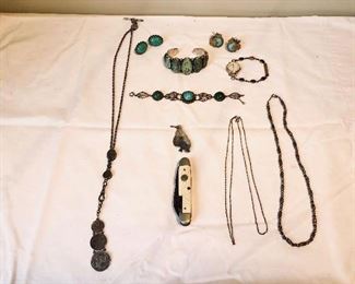 Sun Room-CASE:  A Swedish Krona coin necklace includes a watch fob and slides.  Also shown are a pair of Miriam Haskell vintage earrings; two turquoise/silver bracelets; a vintage scarab watch; a sterling silver penguin pin;  a vintage Scout pocket knife; a  marked TIFFANY sterling double-chain necklace (we believe you would hang a pendant from it); and a costume NAPIER necklace.