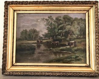 Living Room:  An unsigned antique pastoral cow scene painting shows three cows in a pasture near a pond.  It measures 27"  x  22", including the frame.