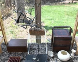 Sun Room:  A Mid-Century cut steel sculpture by "C. Jere" (1968) takes center stage among collectible boxes; knives; and LENOX.  Closer photos follow.  