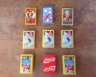 Sun Room:  Vintage playing cards include:  1943 Coca Cola; Red Baron; Coca Cola/World War II-Women Air Force; Coca Cola "Welcome Friend" (one complete deck is in original box); Coca Cola "Refresh"; and vintage red /white Coca Cola.  Some are complete sets while others are partial sets or combined partial sets.