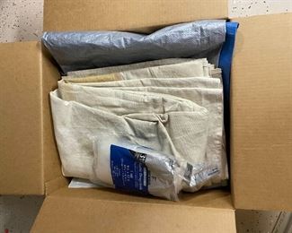 Large Box Full Of Tarps, Canvas, and Plastic Sheeting