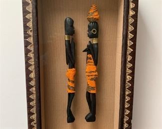 Item #53   $85   Hand carved and beaded Masai figures in shadow box frame, 22" x 12" framed