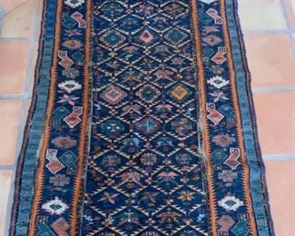 Item #251   $200    Antique handwoven Persian rug,  worn and seperated in spots, 69" x 38"
