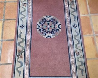 Item #257   $150    Chinese medallion rug, dusty rose, 70" x 35"