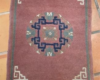 Item #257  $50    Chinese medallion rug, dusty rose, 37" x 25"