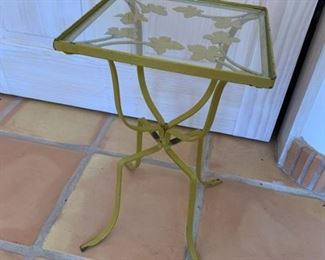 Item # 204  $45   Small vintage metal and glass patio table