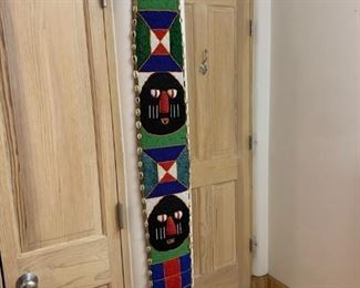 Item #246  $150  African beadwork and cowrie shell piece, 82'' L