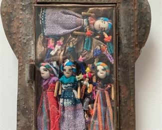 Item #77     $25   Tin retablo with worry dolls, 9 1/4'' x 7''