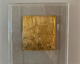 Item #59   $200   Gilt Egyptian panel, 20th C museum piece, mounted and framed in acrylic, 9 1/2" x 8 3/4"