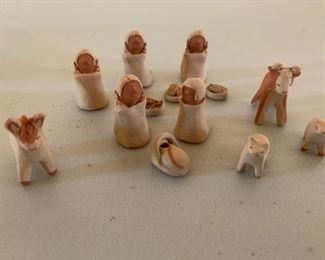 Item #154   $250   Alma L. Concha (Jemez/Taos 1941-), 13 piece  Nativity set, 1'' H