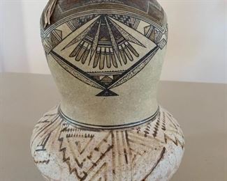 Item #146   $150   Tohono Oodham  pot, turquoise and leather trim, 1st half 20th C, 2 small holes in base, 10 1/4"