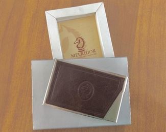 $25 Melkhior hand made leather business card holder.   2.5" H, 4" W, 0.5" D.